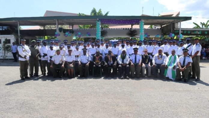 New-Entrant-Correctional-Officers-and-official-guests-pose-for-a-group-photo-after-the-official-program-at-the-Correctional-Headquarter.-1200x675